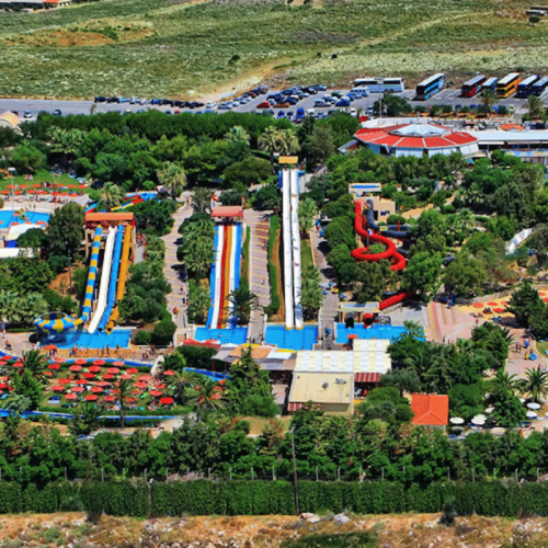 Birds eye view of several large waterslides at a waterpark
