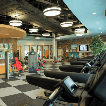 🏖️ Cabana Bay Beach Resort Review with Volcano Bay View – A Fantastic Family Hotel 21 Hotel fitness centre with treadmills, strength equipment, and retro-inspired décor