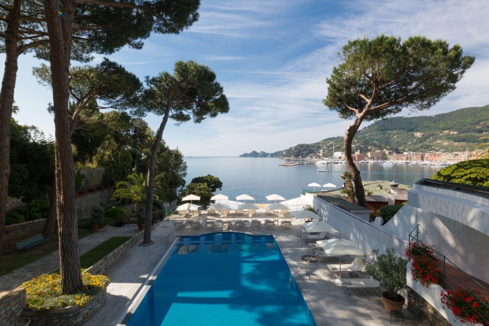 Swimming pool and gardens at Imperiale Palace Hotel overlooking the bay