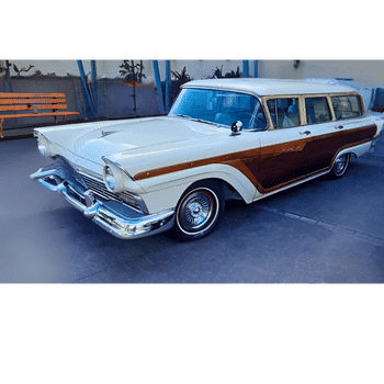 🏖️ Cabana Bay Beach Resort Review with Volcano Bay View – A Fantastic Family Hotel 6 Restored retro station wagon with wood panel accents parked outside at Cabana Bay