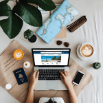 Essential Air-Holiday Terms and Conditions | Travel Site Use Guide 3 Flat lay of travel items including a clipboard titled “Terms and Conditions”, passport, suitcase, coffee, and notebook — visually representing the Air-Holiday Terms and Conditions and setting expectations for responsible travel site use.