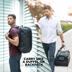 Man carrying black Gomatic travel bag as a backpack and as a duffel, with text "Carry like a duffel or backpack" Gomatic 40L travel duffel bag