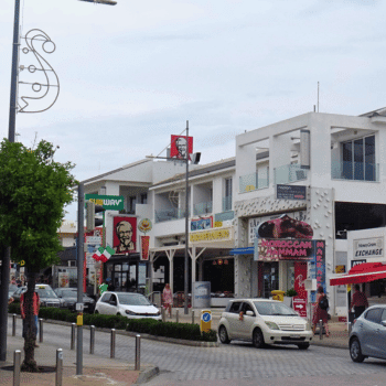 Ayia Napa in May – A Mum & Daughter Escape 🌊☀️ 33 Street view of Ayia Napa with shops, restaurants, and nightlife venues.
