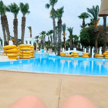 Ayia Napa in May – A Mum & Daughter Escape 🌊☀️ 46 Yellow tubes stacked by the lazy river pool at WaterWorld Ayia Napa