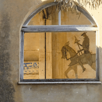 Ayia Napa in May – A Mum & Daughter Escape 🌊☀️ 54 Old mural of a rider seen through a broken window in Varosha