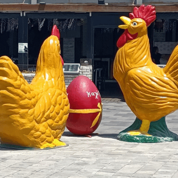 Ayia Napa in May – A Mum & Daughter Escape 🌊☀️ 32 Large colourful chicken statues and Easter egg at Ayia Napa harbour.