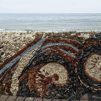Ayia Napa in May – A Mum & Daughter Escape 🌊☀️ 24 Close-up of artistic pebble mosaic on a seaside wall