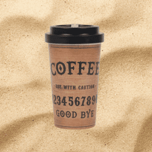 Eco-friendly bamboo fibre travel mug with quirky “Coffee” talking board design on sandy background eco bamboo travel mug