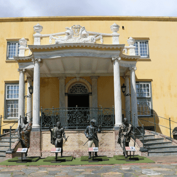🎃 Spooky Season Travel Deals & Haunted Adventures ✈️👻 15 Front view of the Castle of Good Hope in Cape Town, South Africa, with bronze statues on display