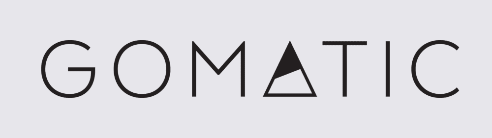 Travel Offers & Discounts 11 Gomatic logo in black text with stylised triangle design