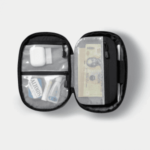 Compare Flights and Travel Essentials 57 Gomatic Navigator Tech Organiser open showing elastic loops and mesh pockets for tech gear