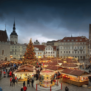 Compare Flights and Travel Essentials 40 Christmas market stalls and tree in Tallinn’s Town Hall Square, Estonia