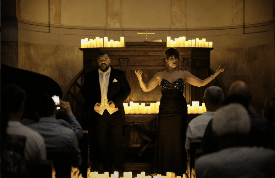 Compare Flights and Travel Essentials 33 Italian opera performers singing by candlelight during an intimate evening concert in Rome