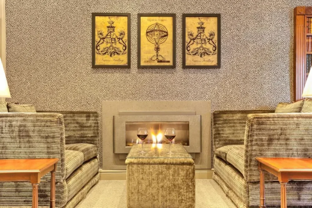 Compare Flights and Travel Essentials 86 Elegant lounge with fireplace at Ambleside Salutation Hotel & Spa in the Lake District