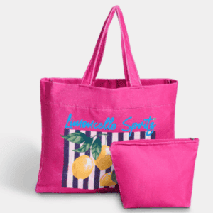 Pink OHS beach bag with “Limoncello Spritz” lemon design and matching pouch placed together for holiday and beach travel use