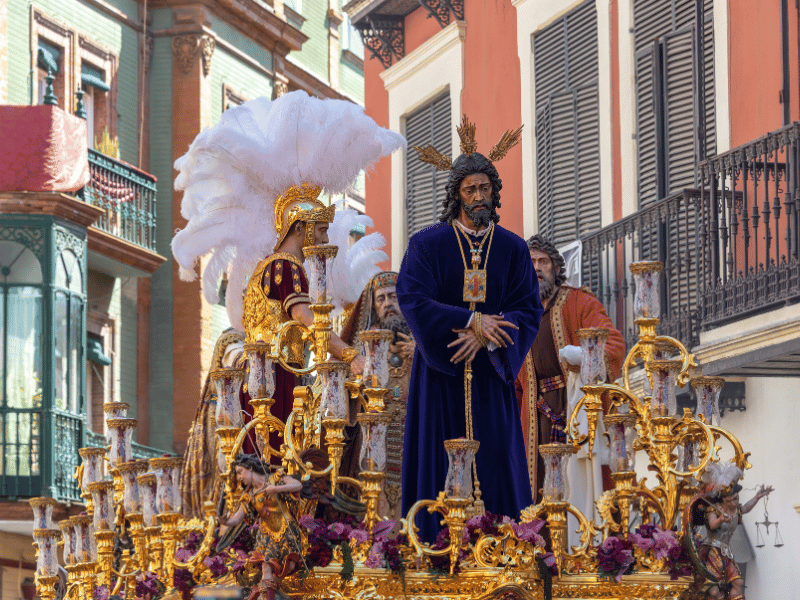 Semana Santa float with religious statue during procession