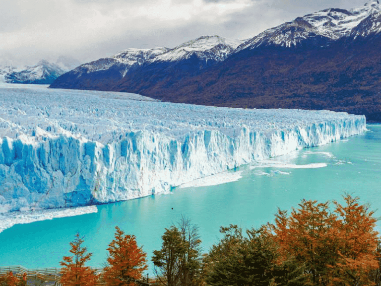 Large glacier with mountains and turquoise water in Patagonia