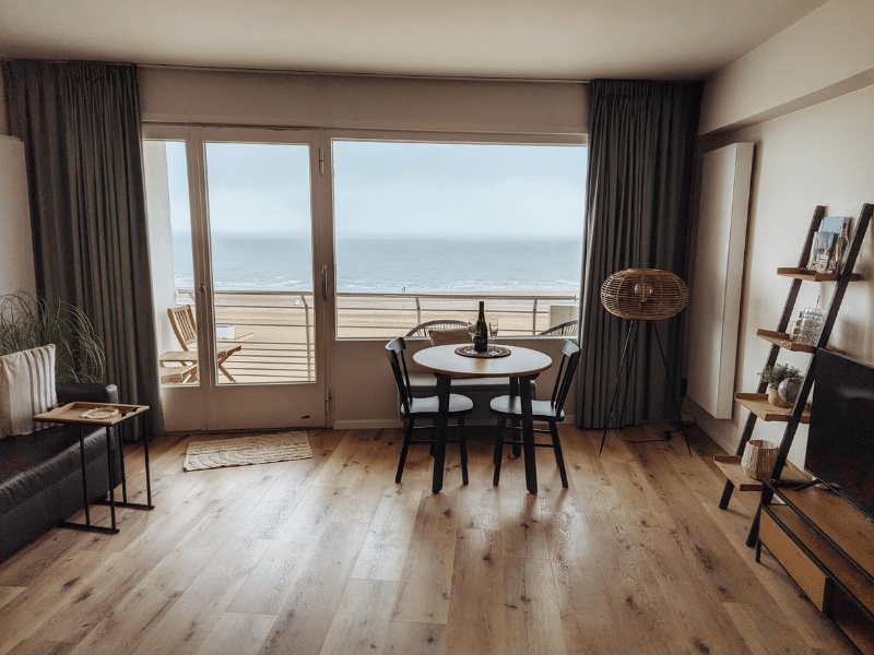 Summer Holidays 30 Beachfront apartment interior with balcony sea view