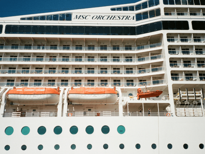 Summer Holidays 37 Large cruise ship exterior with balcony cabins and lifeboats