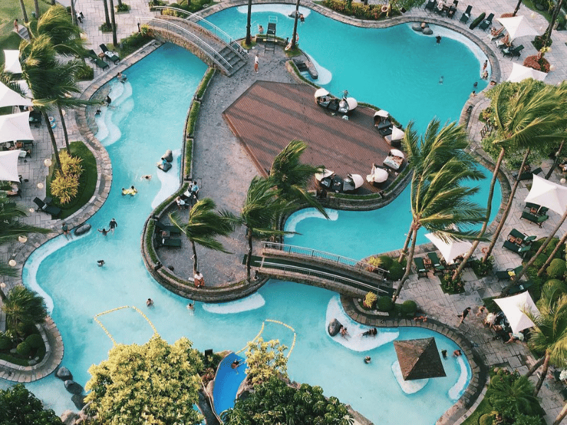 Summer Holidays 32 Tropical resort swimming pools viewed from above