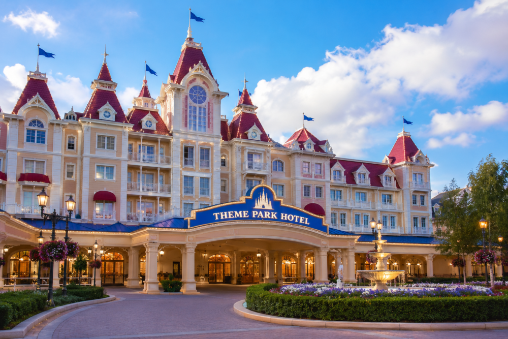Summer Holidays 33 Large themed resort hotel exterior with grand entrance and towers