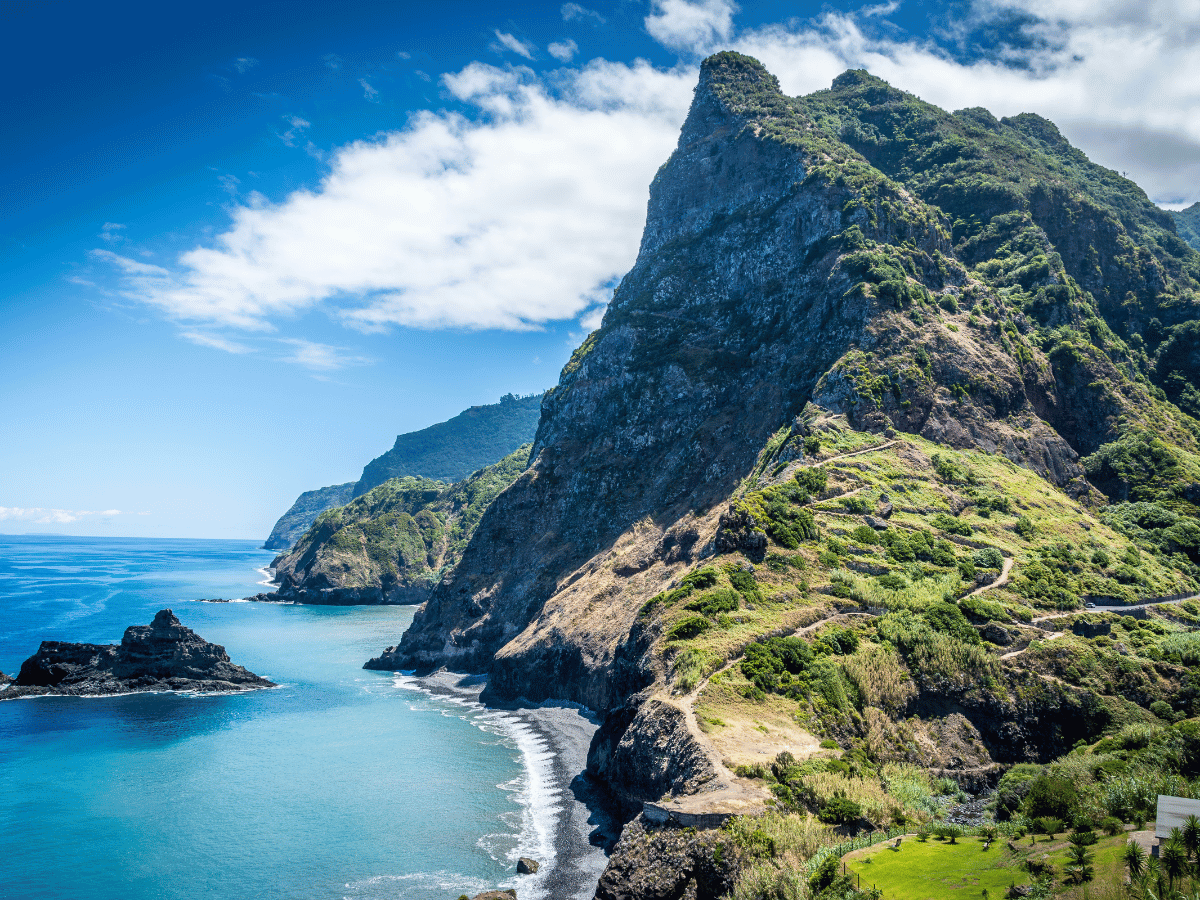 Air-Holiday | Smarter Holiday Planning, Deals & Inspiration 12 Dramatic mountain cliffs overlooking the Atlantic Ocean in Madeira.