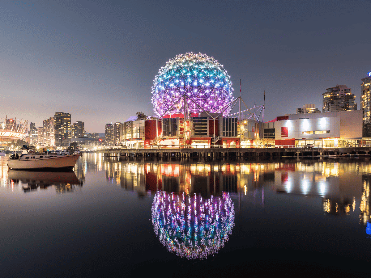 Air-Holiday | Smarter Holiday Planning, Deals & Inspiration 13 Canada Place and Vancouver waterfront illuminated at night.