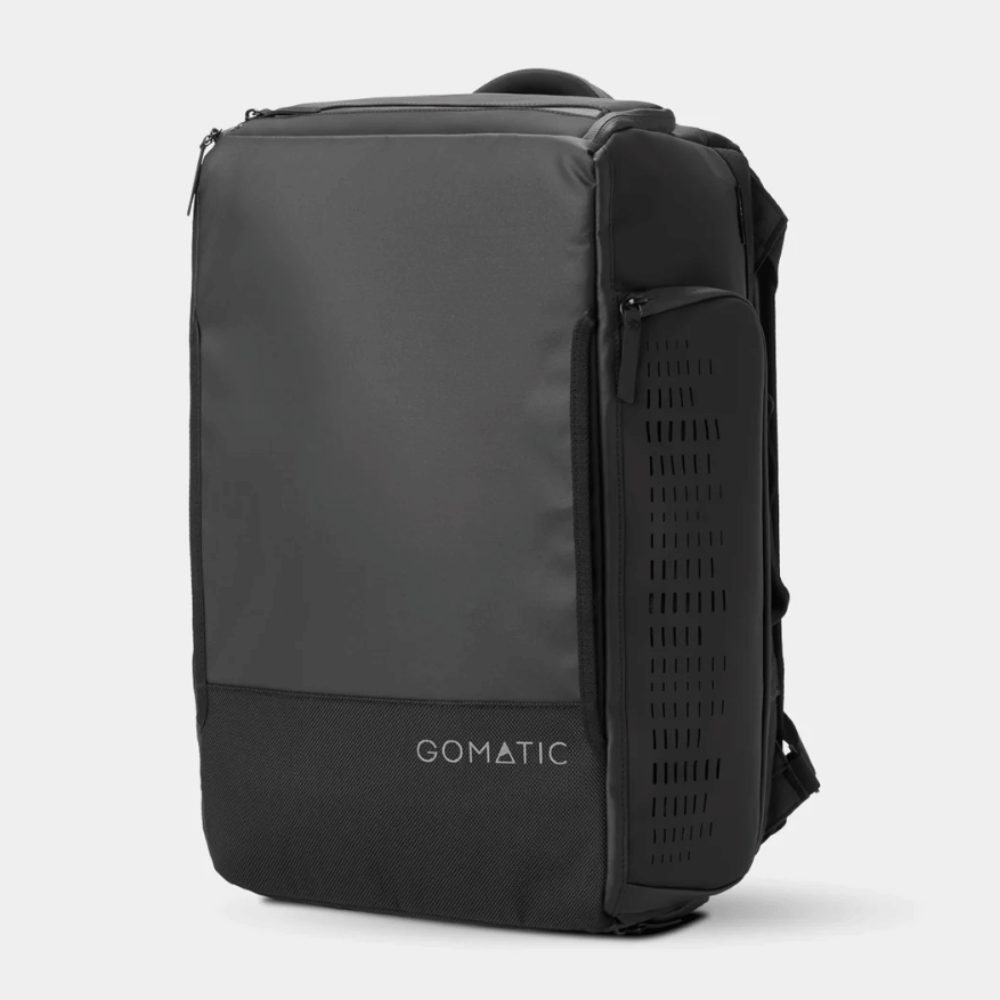 Black Gomatic 30L Travel Duffel shown from the front at an angle.