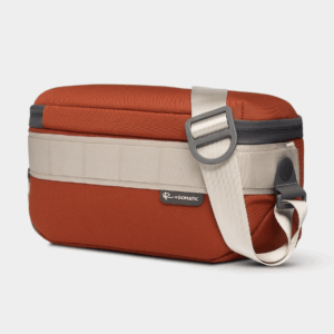 Rust Luma Camera Sling 9L shown from a side angle.