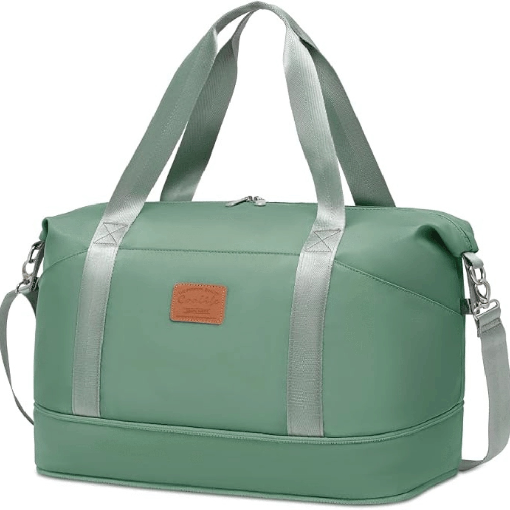 Air-Holiday | Smarter Holiday Planning, Deals & Inspiration 25 Dark green COOLIFE cabin bag with twin handles, detachable shoulder strap, front logo patch and zipped lower section.