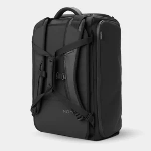 Rear angled view of the black bag showing shoulder straps and a fastening strap