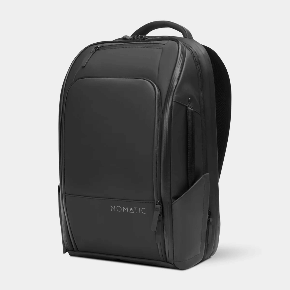 Black Nomatic Travel Pack shown from the front at an angle with top carry handle, front compartments and side pocket.
