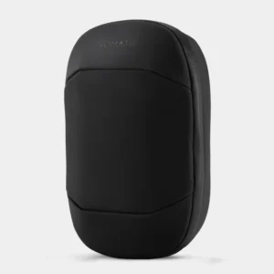 Closed black Nomatic Navigator Tech Organizer shown at an angle with a curved front panel, embossed logo and zip around the edge.